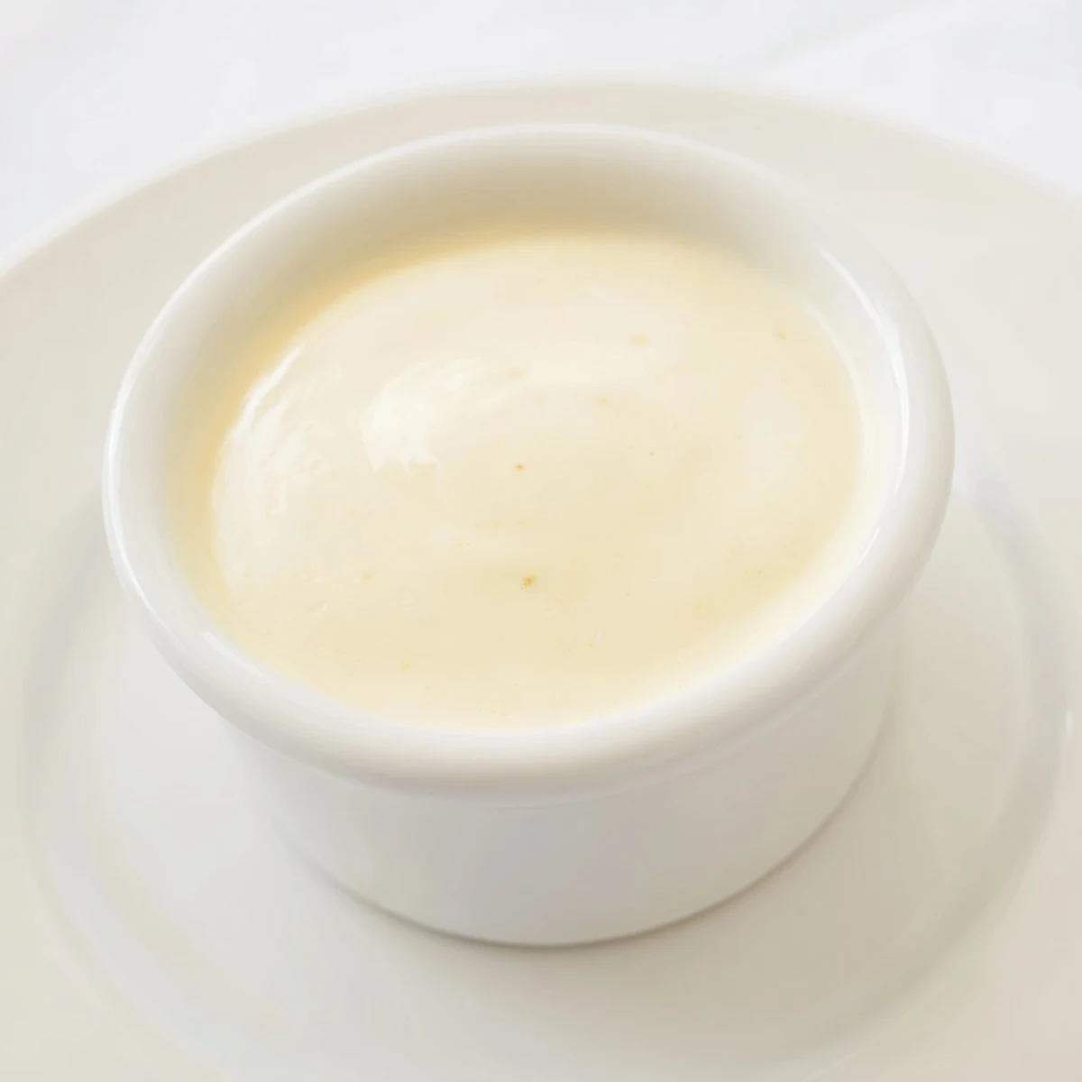 Warm, comforting French creamy custard, chilled and ready to serve with fresh berries and a hint of nutmeg.