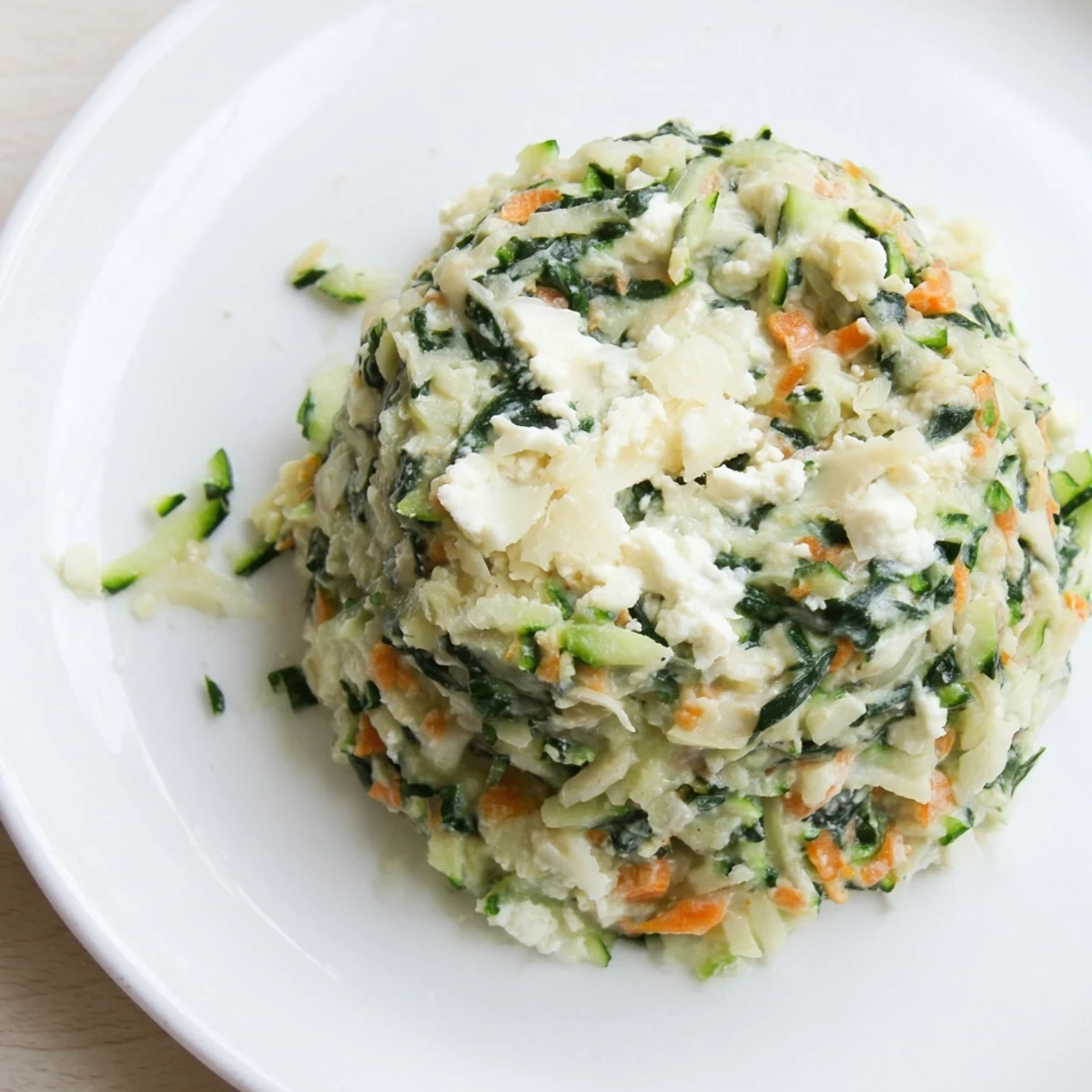 A creamy savory filling made with cheese and veggies, perfect for savory pastries.