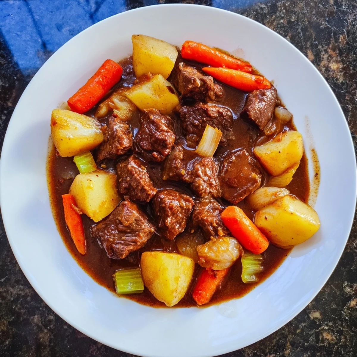 Hearty Beef Stew with Root Vegetables: a comforting, slow-cooked meal served with crusty bread.