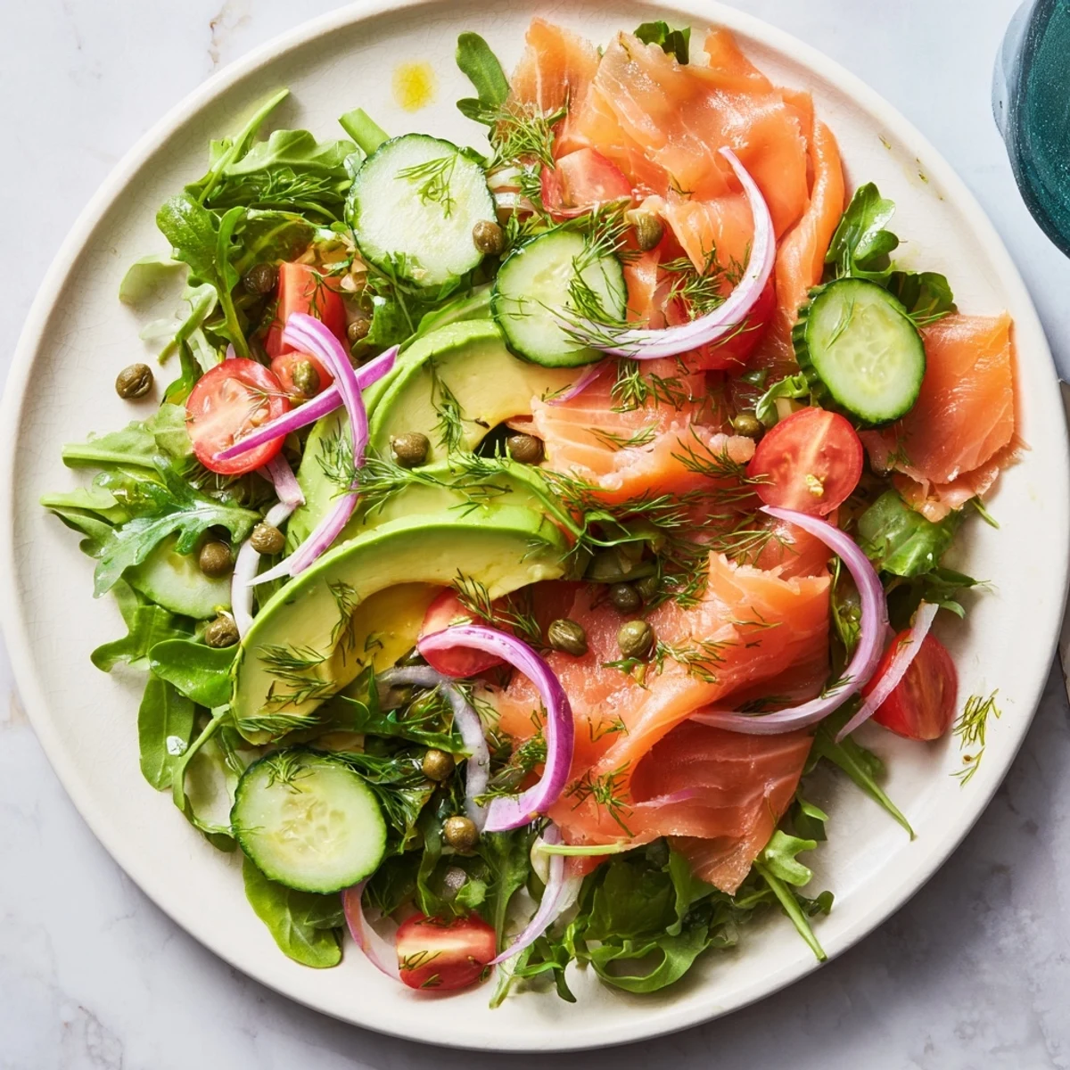 This elegant Smoked Salmon Salad with Avocado, is paired with crisp greens and a tangy dressing.