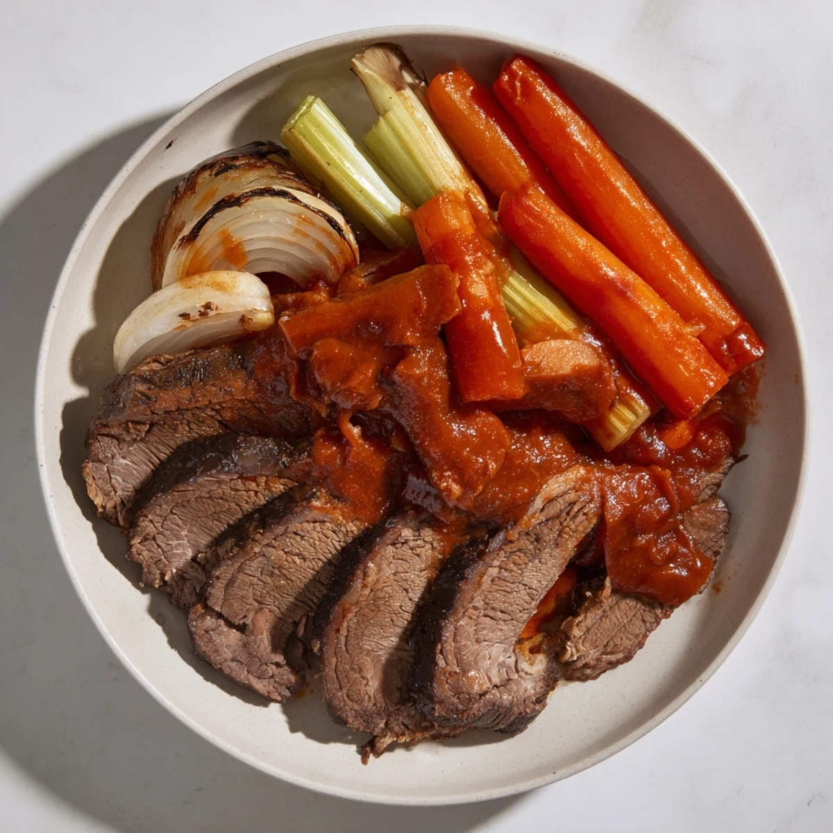 Mouthwatering photo of slow cooked brisket, browned beautifully with aromatic herbs and savory sauce.