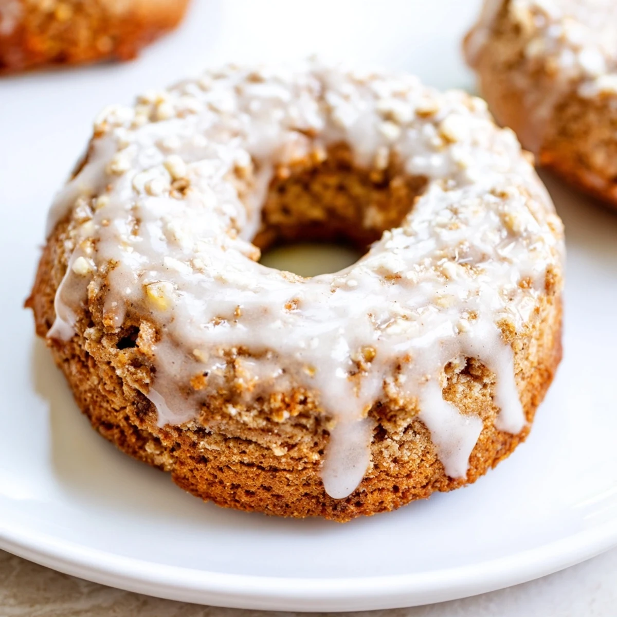 Warm Baked Banana Bread Donuts with cinnamon sugar topping are ready for breakfast or sweet snacking.