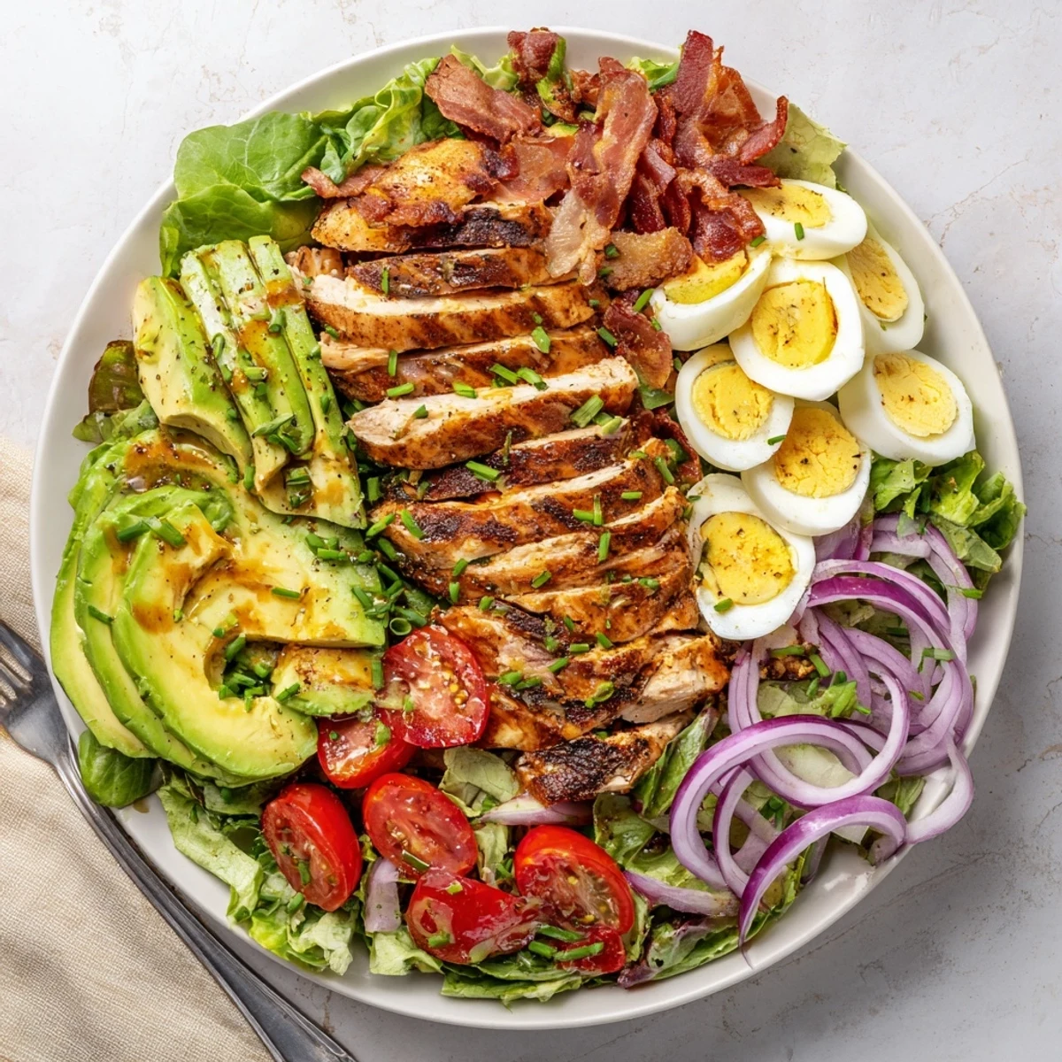 This Paleo Grilled Chicken Cobb Salad offers a vibrant, grain-free meal with smoky and tangy flavors.