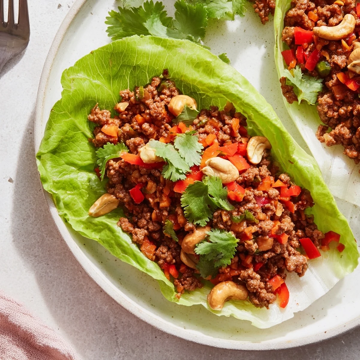 Golden brown seasoned beef with crunchy cashews served in crisp fresh lettuce cups