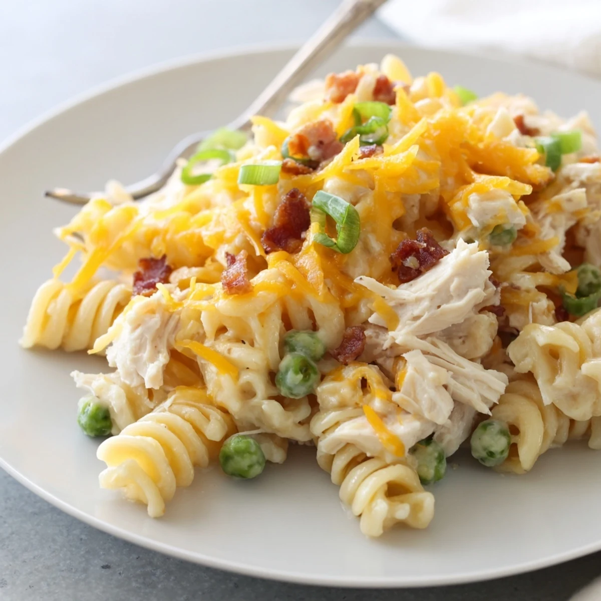 Slow cooker Crack Chicken Casserole with tender pasta in a rich ranch cheese sauce