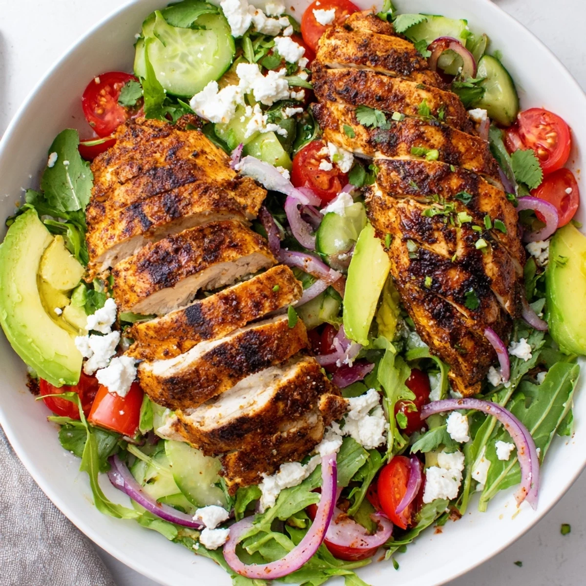 Smoky chicken slices, crisp vegetables, Grilled Chicken Salad Avocado Herb Dressing Recipe.